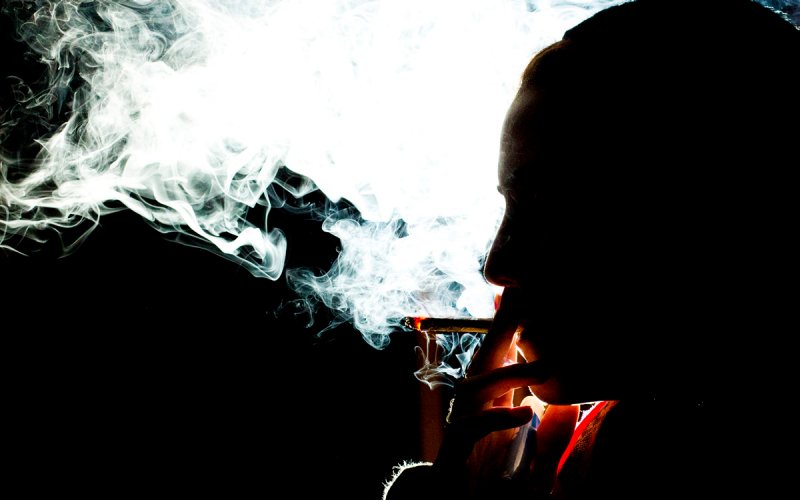 smoking-joint-in-the dark-against-backlight